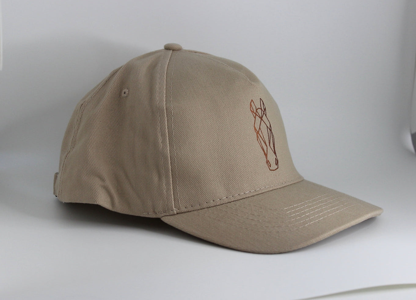 reit cap pferdemotiv für pferdefreunde. Cap in Beige aus Baumwolle mit pferdekopf in kupfer