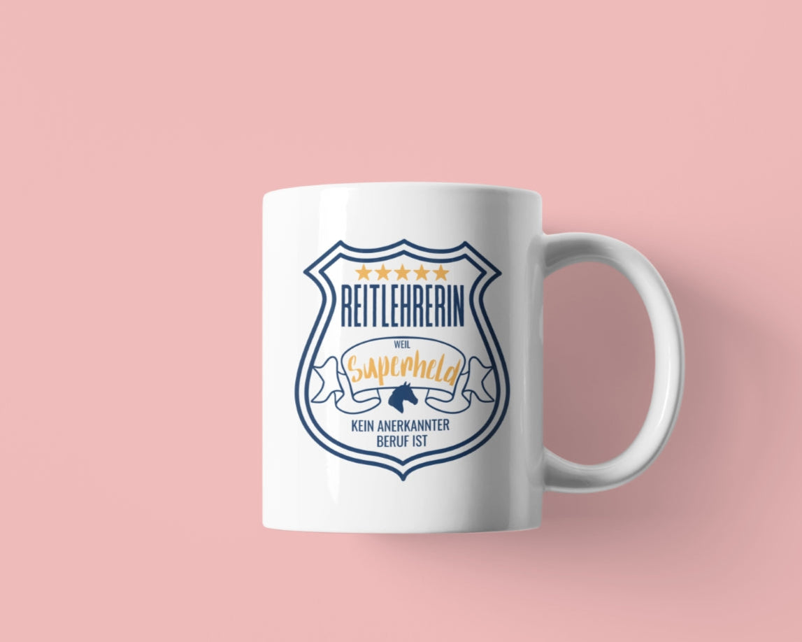 Geschenkidee, Keramiktasse für deine Reitlehrerin Spruch "Reitlehrerin weil Superheld kein anerkannter Beruf ist."