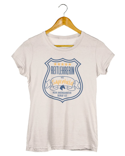 Damenshirt für reitlehrerinnen, Spruch "Reitlehrerin, weil Superheld kein anerkannter Beruf ist." Shirtfarbe Natur