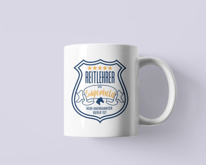 Geschenkidee, Keramiktasse für deinen Reitlehrer Spruch "Reitlehrer weil Superheld kein anerkannter Beruf ist." 
